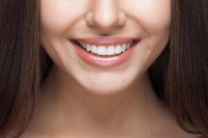 Woman With Healthy White Teeth