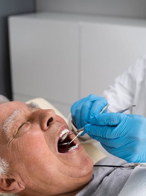 Dentail Care For Senior Man — Advanced Dental Southern Highlands In Moss Vale, NSW