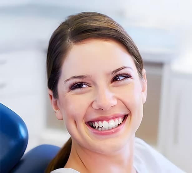 Woman smiling at her Mona Vale Dentist