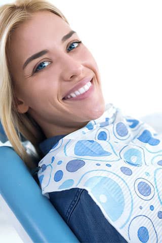 Smiling And Satisfied Patient In Dental Office Chair -— Advanced Dental Southern Highlands In Moss Vale, NSW