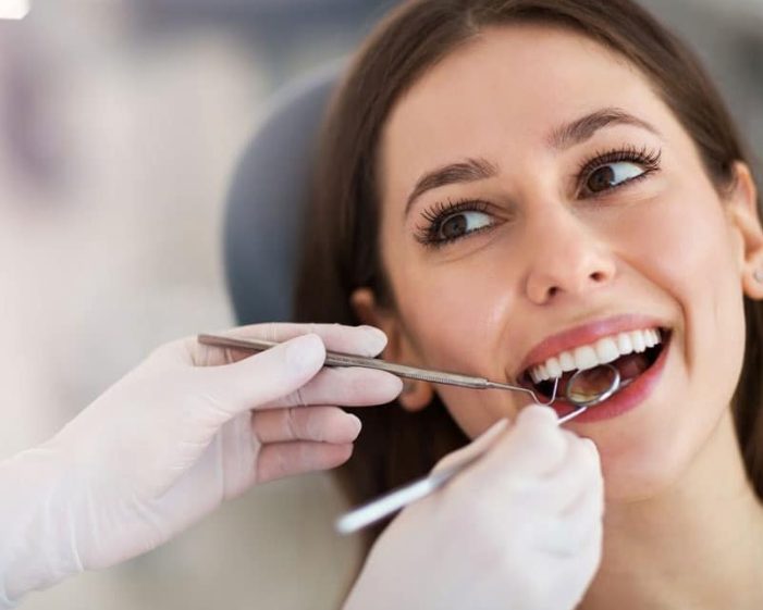 Woman Having Teeth Examined By The Dentist — Advanced Dental Southern Highlands In Moss Vale, NSW