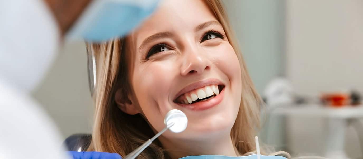 Woman Smiling At Her Dentist In Appointment — Advanced Dental Southern Highlands In Moss Vale, NSW